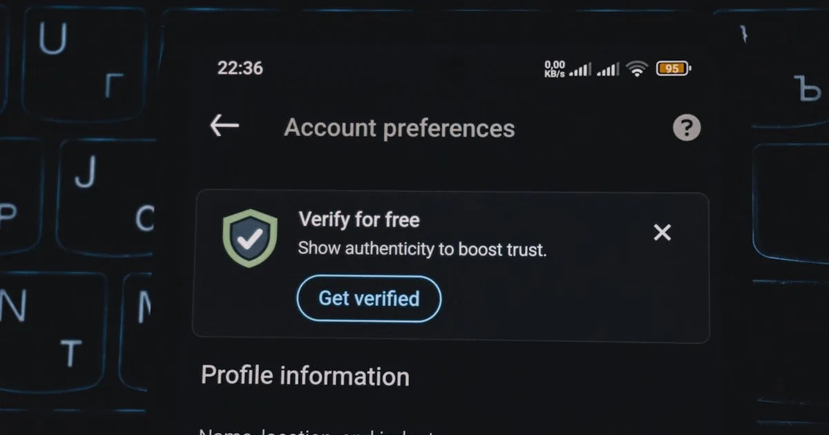 Close-up of a smartphone screen displaying account verification alert. Ideal for security and authen